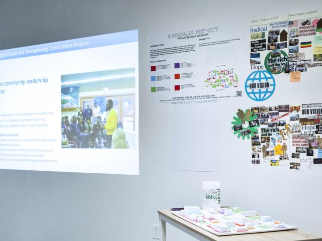 Socially Just City exhibition showing video, slides, models, and pamphets