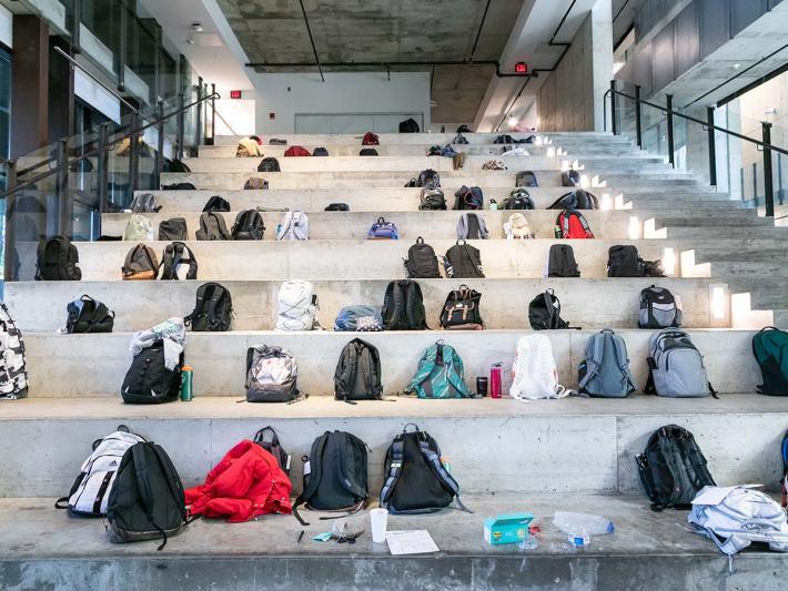 Backpacks on the Big Stairs at Knowlton Hall